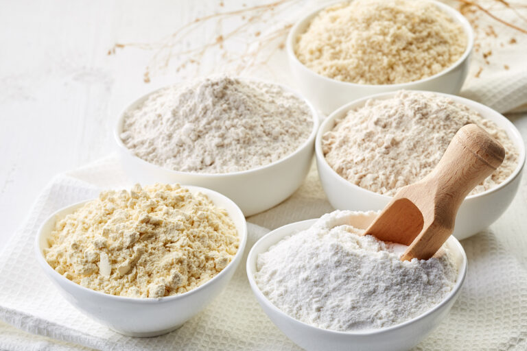Bowls of gluten free flour (chick peas, rice, buckwheat, amaranth seeds, almond)
